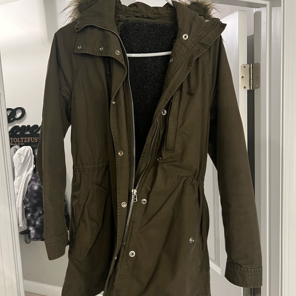 Army green jacket with fleece lining and fur hood